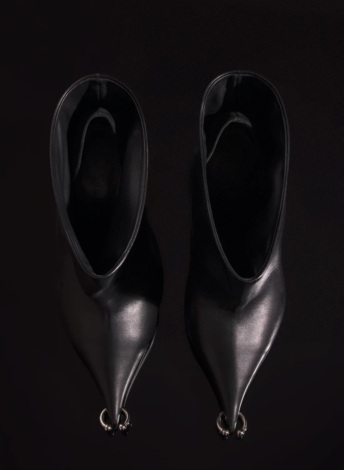 PIERCING ANKLE BOOTS IN CALFSKIN BLACK LEATHER